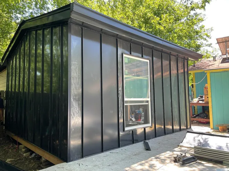 Black standing seam metal wall panels for Metal Roof Installation in Bartow