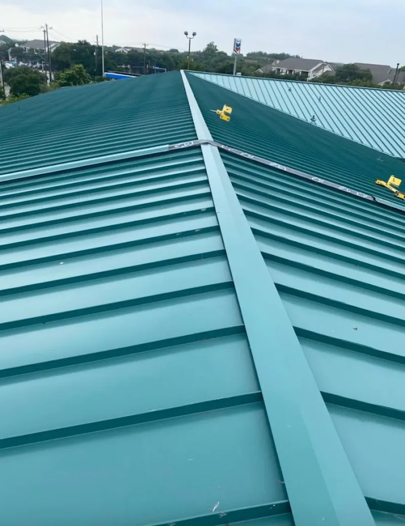 Green commercial metal roof ridge and valley for Metal Roof Repair in Bartow