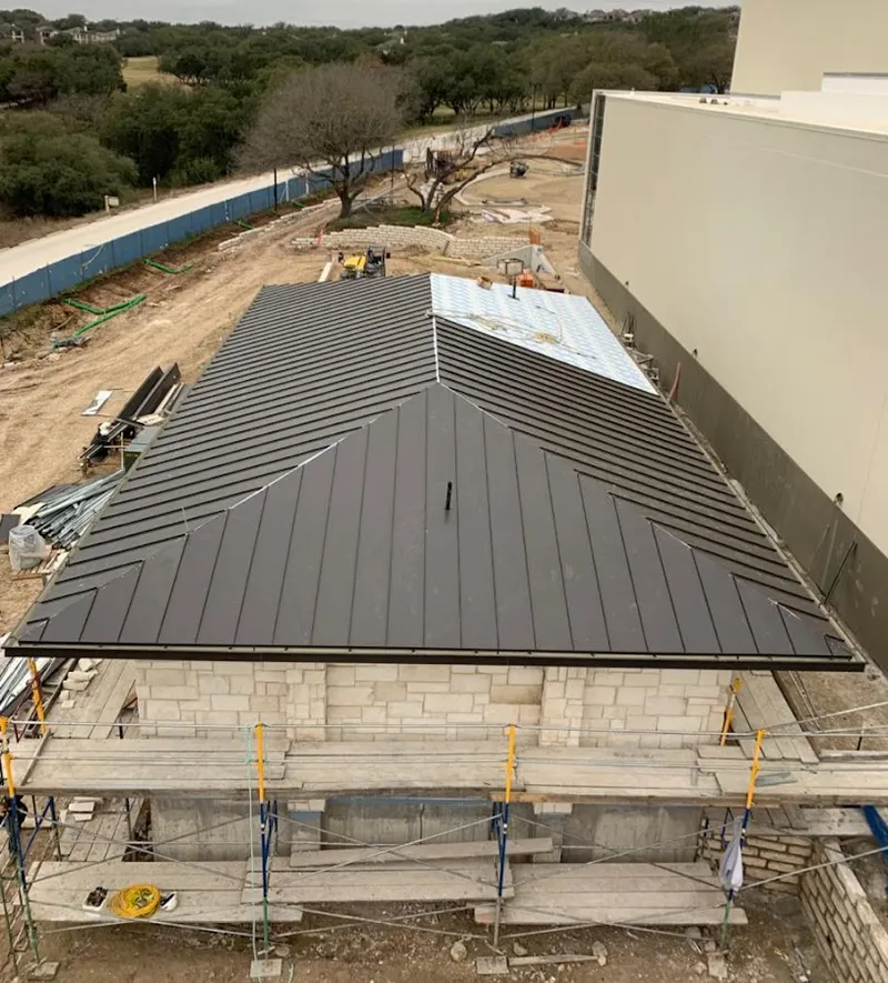 Metal roof new construction with scaffolding in Bartow